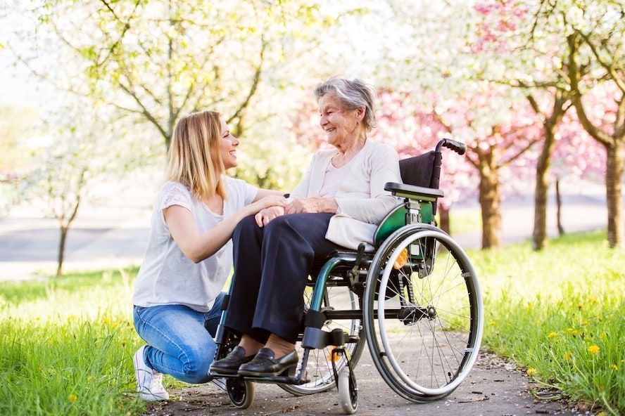 Elderly grandmother using a rented wheelchair - Cloud of Goods