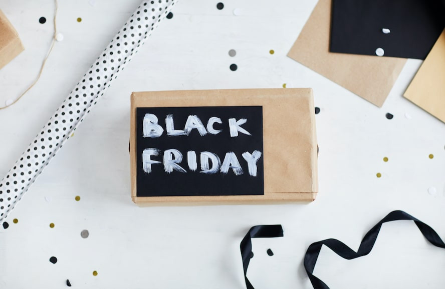 Black friday written on board - Cloud of Goods
